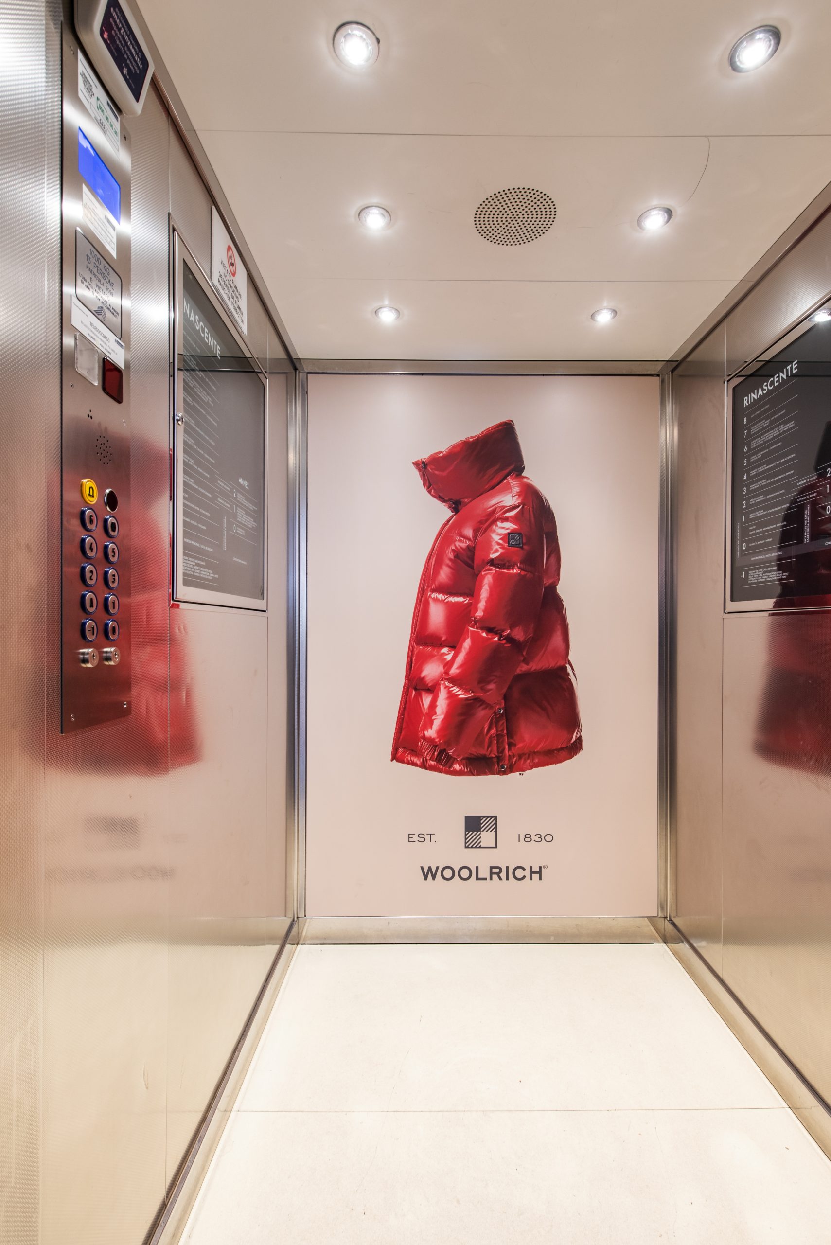 Woolrich images in elevator at Rinascente, Milano