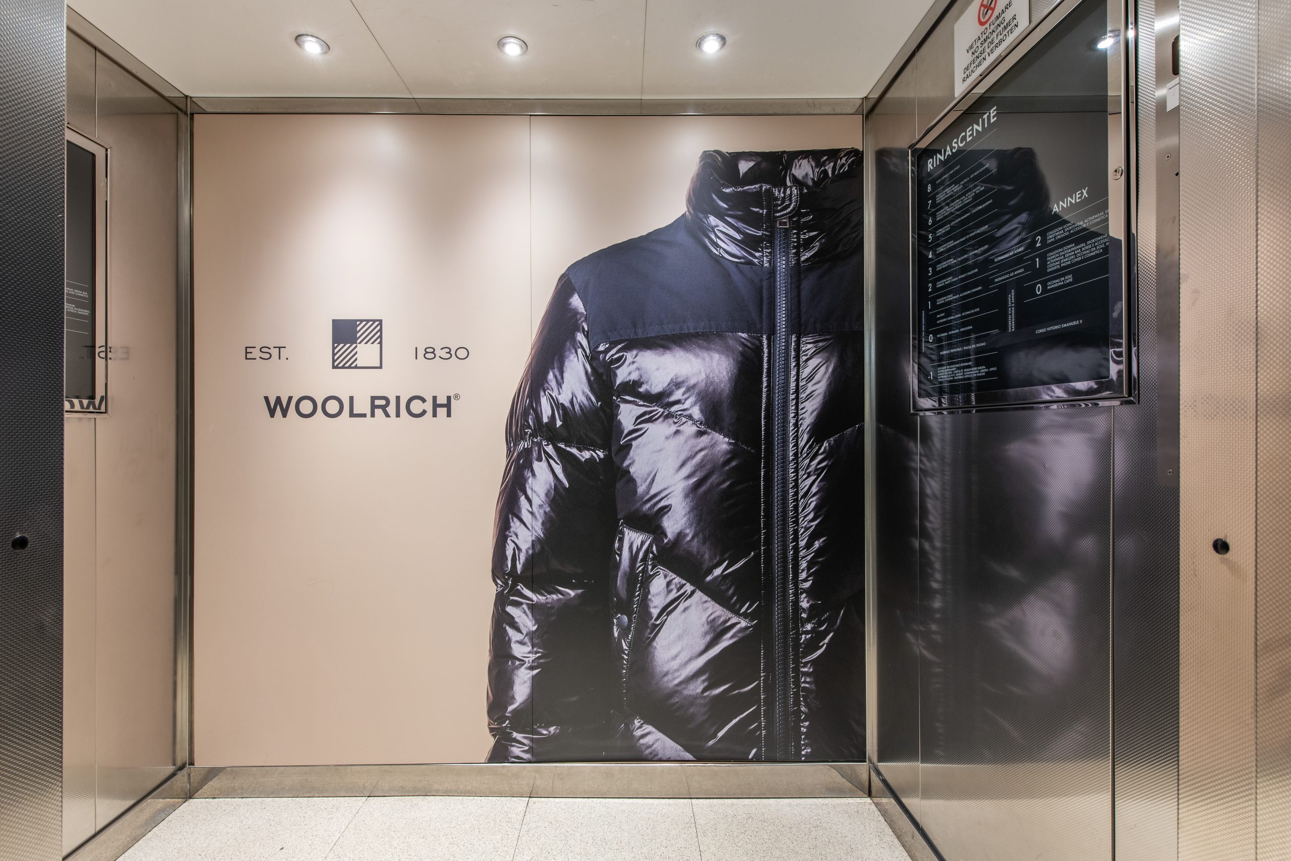 Woolrich images in elevator at Rinascente, Milano